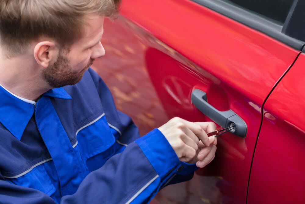 Automotive locksmith from Locker Smith unlocking a car in London